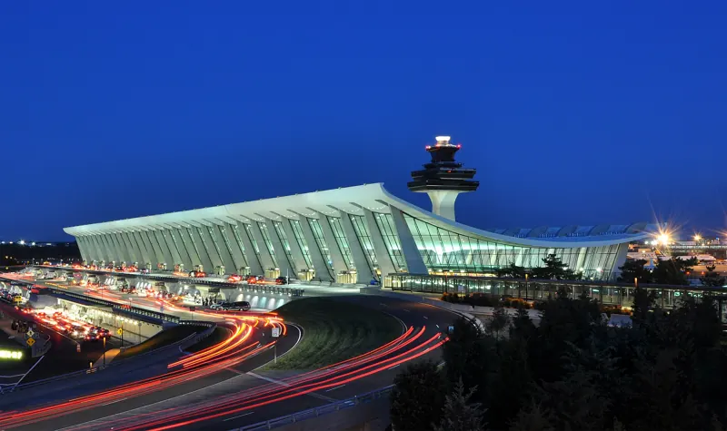 An airport terminal at dusk